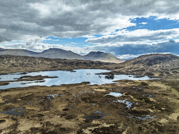 Rannoch Moor from a drone over Loch Ba and Loch of the Armpit, A82 Highland Way, Argyll and Bute, West Highlands, Scotland, United Kingdom