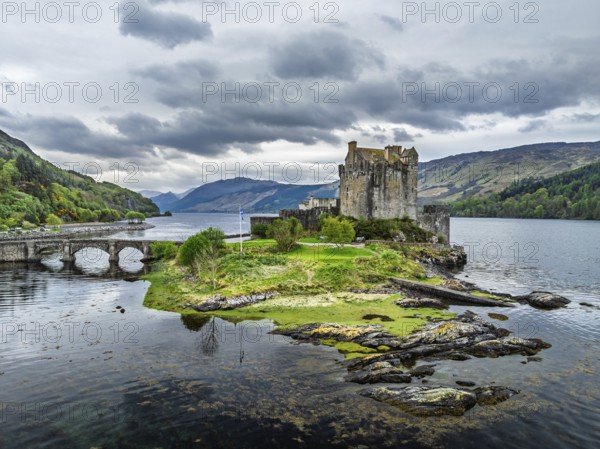 Eilean Donan Castle and Loch Duich from a drone, Isle of Skye, Highlands, Scotland, England, United Kingdom