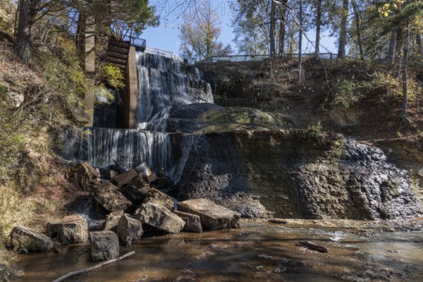 Water diverted from nearby Chunky River to this man-made waterfall to power a grist and cotton mill at Dunn's Falls Park near Enterprise, Mississippi, USA
