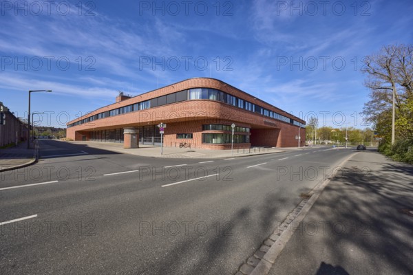 Fire station 1, modern architecture, driveway, street, lantern, trees, blue sky, cirrostratus clouds, intersection Reutersbrunnenstraße with Mannertstraße, Nuremberg, Middle Franconia, independent city, Bavaria, Germany