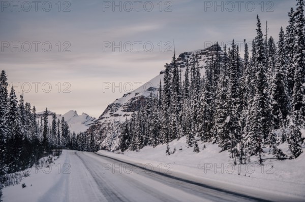 Winter road trip on the Icefields Parkway with lots of snow and ice, Banff National Park, Jasper National Park, Alberta, Canada