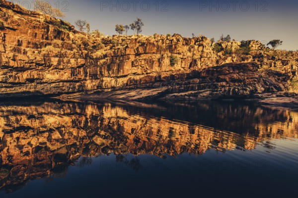 Bell Gorge waterfall, a body of water in north-west Australia in the Kimberley. Sunrise in the outback, Australia