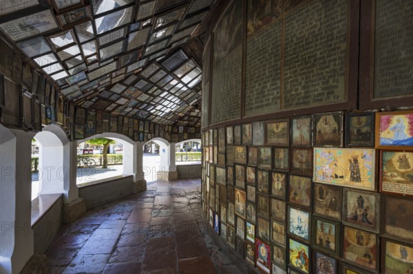 Votive plaques in the walkway around the Chapel of Grace, Kapellplatz, place of pilgrimage, Altötting, Upper Bavaria, Bavaria, Germany