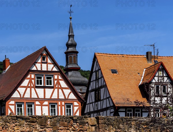 The old town centre with half-timbered houses, church towers and remains of the town wall in Büdingen, Hesse, Germany