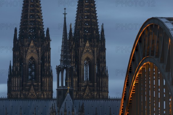 Cologne Cathedral and the Hohenzollern Bridge illuminated with LED lights, Cologne, North Rhine-Westphalia, Germany