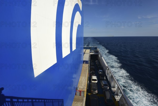 A car ferry of the GNV shipping company on its way from Palermo / Sicily shortly in front of entering the harbour of Genoa. Lorry trailers and cars can be seen on board