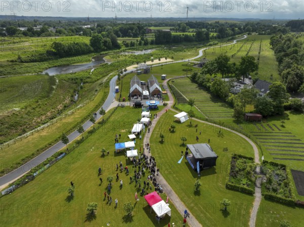 Recklinghausen, Castrop-Rauxel, Ruhr area, North Rhine-Westphalia, Germany - Sports festival in the EMSCHERLAND adventure park, a new nature and water adventure park on the renaturalised Emscher, at the water cross of the Emscher with the Rhine-Herne Canal on the city boundary of Recklinghausen and Castrop-Rauxel. Flood protection by expanding the area. The ecological focus at the confluence of the Suderwicher Bach and Emscher will also become a future garden for the International Garden Exhibition IGA 2027. Before the renaturalisation, the Emscher river system was an open, above-ground wastewater channel, combined sewer with surface water and wastewater