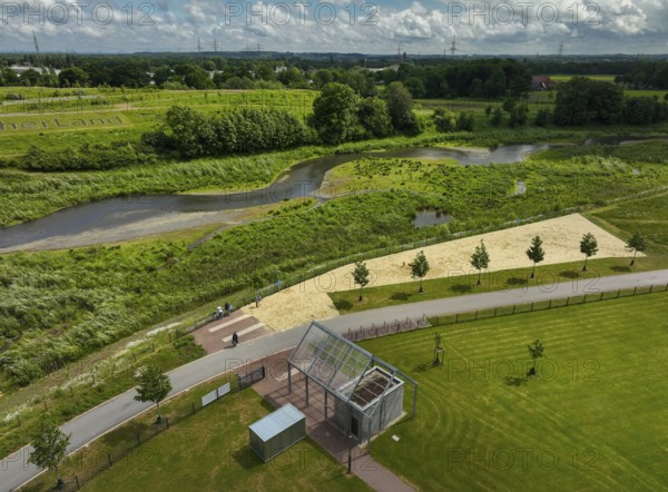 Recklinghausen, Castrop-Rauxel, Ruhr area, North Rhine-Westphalia, Germany - Renaturalised Emscher, EMSCHERLAND adventure park, a new nature and water adventure park on the renaturalised Emscher, at the water crossing of the Emscher with the Rhine-Herne Canal on the city boundary of Recklinghausen and Castrop-Rauxel. In front is the Emscherstrand, a 1000 square metre sandy beach by the river. Flood protection by expanding the area. The ecological focus at the confluence of Suderwicher Bach and Emscher will also be a future garden for the International Garden Exhibition IGA 2027. Before the renaturalisation, the Emscher river system was an open, above-ground wastewater channel, combined sewer with surface water and wastewater