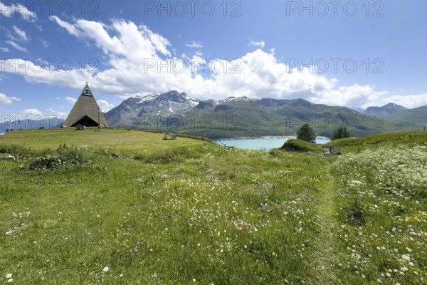 Panoramic view from plateau above Lanslebourg-Mont-Cenis to reservoir Lac du Mont Cenis left Museum Musée du Mont Cenis at pass road to pass Alpine pass mountain pass Col du Mont Cenis Colle del Moncenisio, Mont Cenis massif, Massif du Mont-Cenis, Graian Alps, Lanslebourg, Rhone-Alpes, France