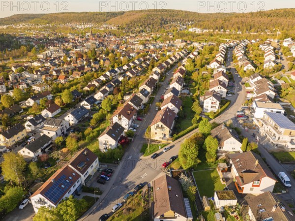 Residential area with terraced houses in a green landscape and hilly surroundings, Nagold, Black Forest, Germany