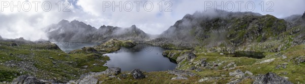 Mountain lakes Wangenitzsee and Kreuzsee, cloudy mountain peaks in the morning, Schober group, Hohe Tauern National Park, Carinthia, Austria
