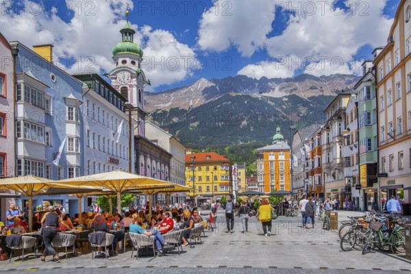 Street café on the pedestrian zone Maria-Theresien-Strasse in front of the Nordkette of the Karwendel Mountains, Innsbruck, Inntal, Tyrolean Alps, Tyrol, Austria