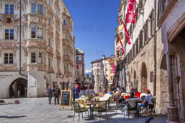 Street café in front of the historic Helblinghaus on Herzog-Friedrich-Strasse in the historic city centre, Innsbruck, Inntal, Tyrolean Alps, Tyrol, Austria