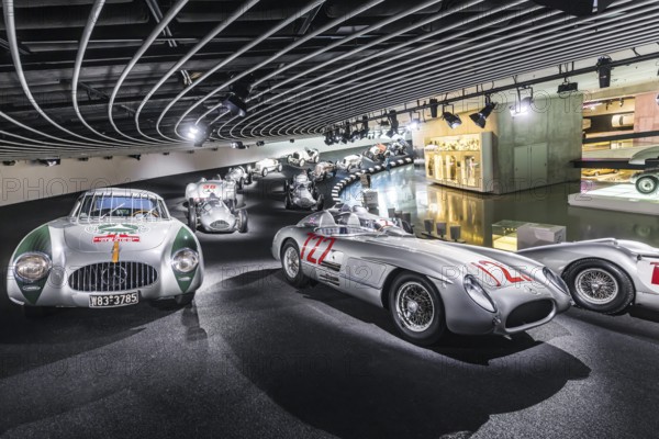 The Mercedes-Benz Museum in Stuttgart presents a journey through the automotive history of the global corporation. Myth 7: Racing cars and Silver Arrows - races and records. The history of the Mercedes star begins with the first automobile in 1886. Stuttgart, Baden-Württemberg, Germany