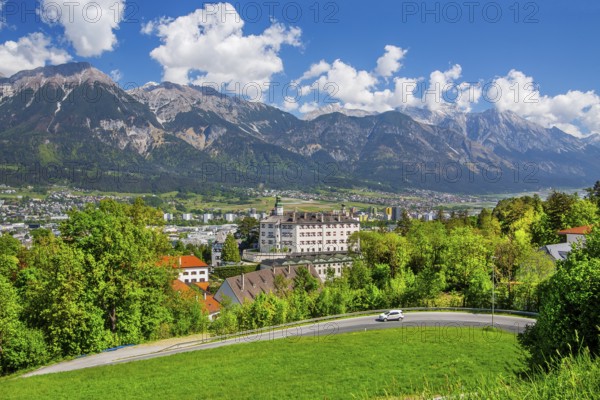 Ambras Castle on the outskirts of the city in front of the northern range of the Karwendel mountains, Innsbruck, Inntal, Tyrolean Alps, Tyrol, Austria