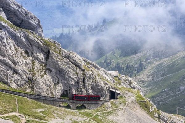 Pilatus railway cogwheel railway just in front of the summit of Mount Pilatus in the Swiss Alps in Pilatus, Switzerland