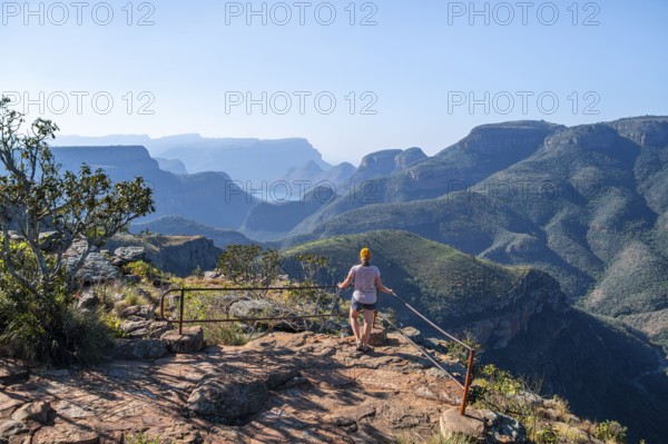 Tourist at the viewpoint, view of the Blyde River gorge, Lowveld Viewpoint, in the evening light, canyon landscape, Blyde River Canyon, Panorama Route, Mpumalanga, South Africa
