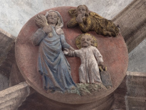 Mary dragging the infant Jesus into the school, keystone in the altar vault of the Church of Our Lady, Nuremberg, Middle Franconia, Bavaria, Germany