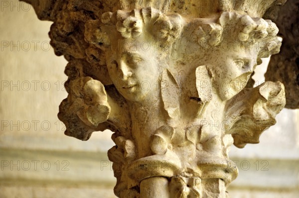 Slender Gothic column with filigree capital in the cloister, Gothic basilica of the Cistercian Abbey of Fossanova, Cistercian-Burgundian architectural style, Priverno, Province of Latina, Lazio, Italy