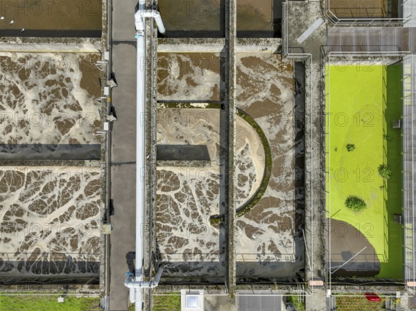 Germany - Wastewater treatment in a sewage treatment plant, clarifier with brown wastewater (symbolic photo) . The first purification stage of a sewage treatment plant comprises mechanical purification (removal of coarse solids, sand, fats), the second stage the biological process (removal of nutrients by means of micro-organisms), the third stage is known as chemical-physical treatment (phosphate precipitation) . In future, a fourth treatment stage will be necessary to remove trace substances, microplastics and medicines