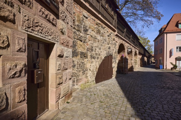 Spittlertor wall, alley, old town, city fortification, city wall, buildings, trees, blue sky, cloudless, Nuremberg, Middle Franconia, independent city, Bavaria, Germany