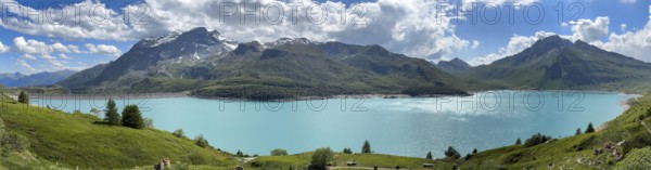 Panoramic view from plateau above Lanslebourg-Mont-Cenis with pass road to pass Alpine pass mountain pass Col du Mont Cenis Colle del Moncenisio on Lac du Mont Cenis, Mont Cenis Massif, Massif du Mont-Cenis, Graian Alps, Lanslebourg, Rhone-Alpes, France