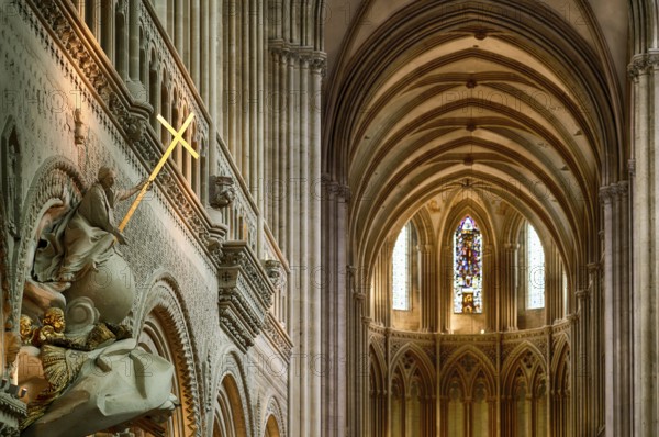 Interior view, angel on pulpit, holding a shining golden sword, Cathédrale Notre-Dame de Bayeux, Bayeux, Calvados, France