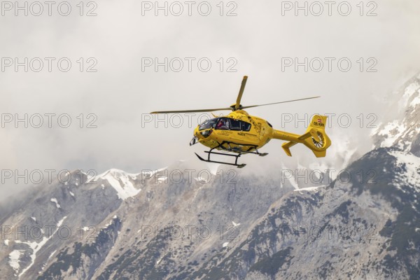 Rescue helicopter, emergency helicopter in flight, Schwaz, Tyrol, Austria