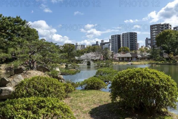 Shukkei-en with green plants and Takuei-chi pond in spring, historical Japanese strolling garden, Japanese garden, green area, tourist attraction, sight, Naka-ku, Hiroshima, Japan