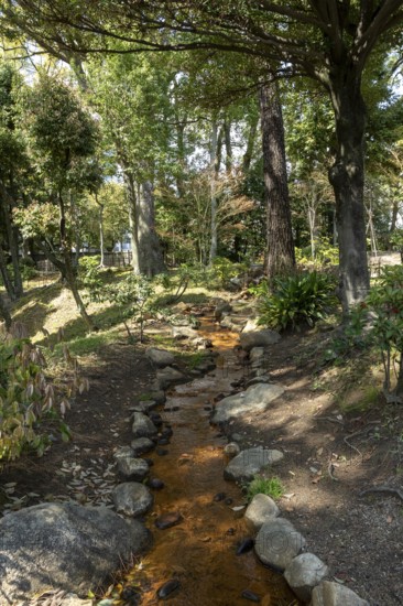 Shukkei-en with Hakuryu-sen stream, green plants and trees in spring, historical Japanese strolling garden, Japanese garden, green area, tourist attraction, sight, Naka-ku, Hiroshima, Japan