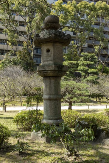 Toro stone lantern in Shukkei-en, historical Japanese strolling garden, Japanese garden, green area, tourist attraction, sight, Naka-ku, Hiroshima, Japan
