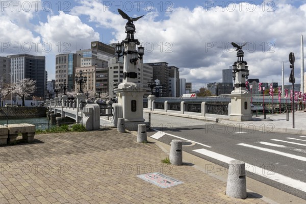 Tourist attraction, place of interest, historic Enkobashi stone bridge over the Enko River with eagle figures, Enko-bashi Bridge, built in 1926, restored in 2016 for the 70th anniversary of the atomic bombing, Enkobashicho, Minami Ward, Hiroshima, Japan