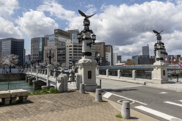 Tourist attraction, place of interest, historic Enkobashi stone bridge over the Enko River with eagle figures, Enko-bashi Bridge, built in 1926, restored in 2016 for the 70th anniversary of the atomic bombing, Enkobashicho, Minami Ward, Hiroshima, Japan
