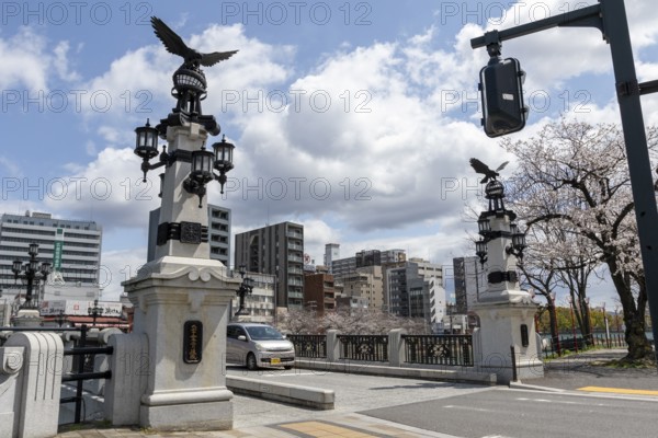 Tourist attraction, place of interest, historic Enkobashi stone bridge over the Enko River with eagle figures, Enko-bashi Bridge, built in 1926, restored in 2016 for the 70th anniversary of the atomic bombing, Enkobashicho, Minami Ward, Hiroshima, Japan