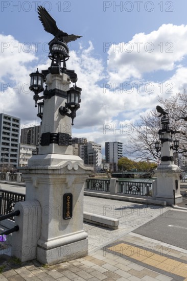 Tourist attraction, place of interest, historic Enkobashi stone bridge over the Enko River with eagle figures, Enko-bashi Bridge, built in 1926, restored in 2016 for the 70th anniversary of the atomic bombing, Enkobashicho, Minami Ward, Hiroshima, Japan