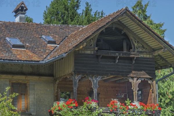 Old villa with wooden shingle façade, large balcony with floral decorations, around 1900, Dornbirn, Vorarlberg, Austria