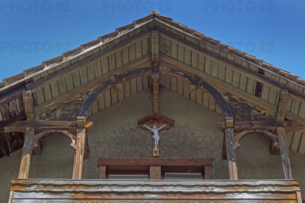 Old villa, wooden shingle façade with crucifix around 1900, Dornbirn, Vorarlberg, Austria