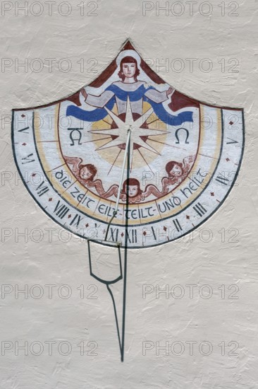 Sundial with the saying, time hurries-divides-and heals, Church of the Assumption of the Virgin Mary, Frauenzel, Allgäu, Bavaria, Germany