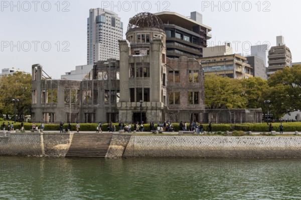 Ruins of the Atomic Bomb Dome, landmark, UNESCO World Heritage Site, peace memorial and memorial to the victims of the atomic bombing of Hiroshima in the Peace Park on the Otagawa River, Naka Ward, Hiroshima, Japan