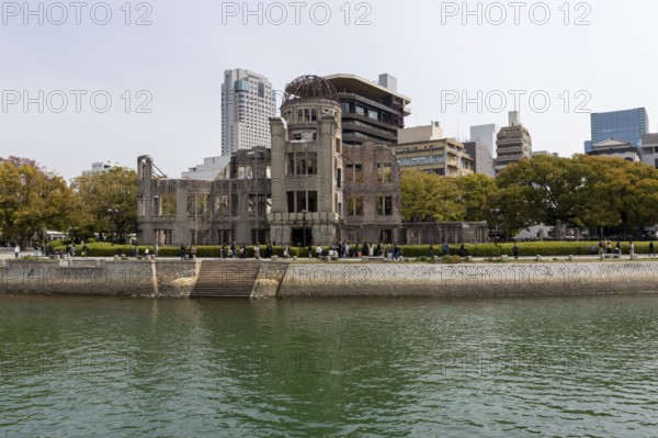 Ruins of the Atomic Bomb Dome, landmark, UNESCO World Heritage Site, peace memorial and memorial to the victims of the atomic bombing of Hiroshima in the Peace Park on the Otagawa River, Naka Ward, Hiroshima, Japan