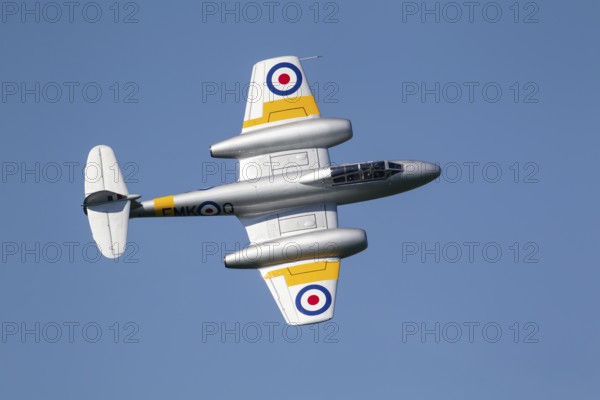 Gloster Meteor military jet aircraft in Royal air force RAF colours flying, England, United Kingdom