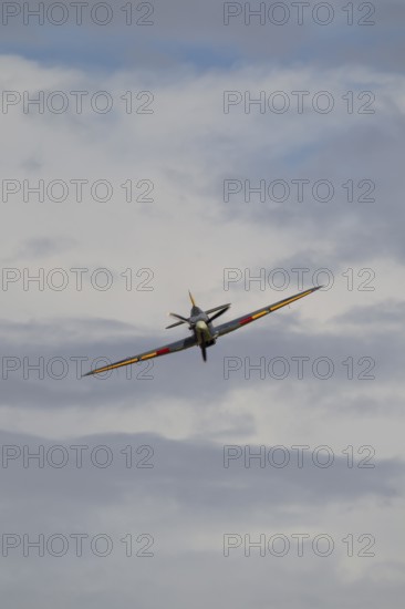 Hawker Hurricane warbird military aircraft in Royal air force RAF colours flying, England, United Kingdom