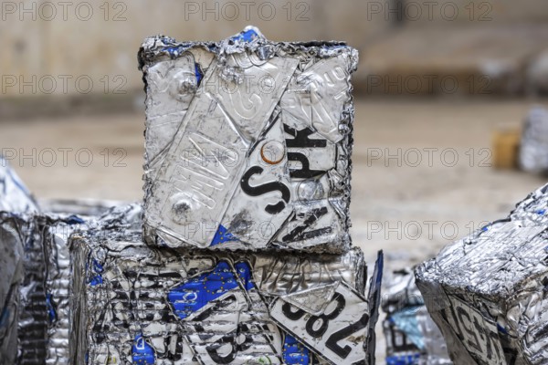 Cubes made from scrap metal, disused car licence plates. Symbolic photo. Stuttgart, Baden-Württemberg, Germany