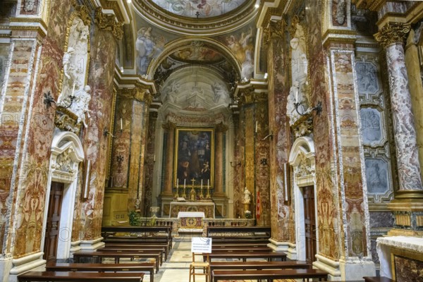 Nave with chancel of the baroque church Chiesa di San Nicola dei Lorenesi in baroque architecture, Rome, Lazio, Italy