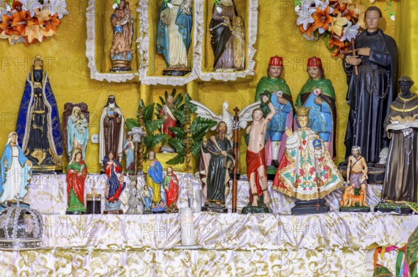 Images of saints and entities present on an Afro-Brazilian altar in Congado in Minas Gerais, Belo Horizonte, Minas Gerais, Brazil