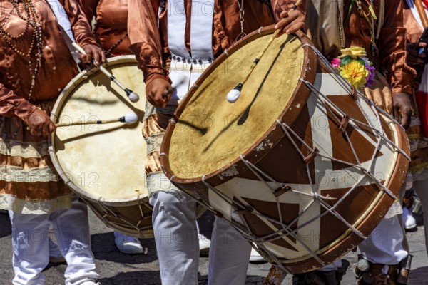 Drums and colorful clothes on the streets of Belo Horizonte at the Congado festival in Minas Gerais, Belo Horizonte, Minas Gerais, Brazil
