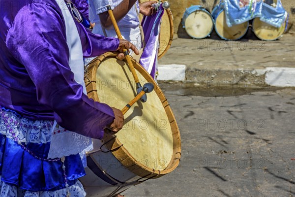 Congado parade with musicians and their drums and colorful clothes on the streets of Belo Horizonte, Minas Gerais