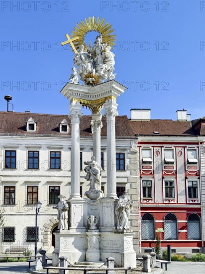 Baroque monument with ornate columns and figures on a Trinity Column Old Town Krems Wachau Waldviertel Lower Austria Austria