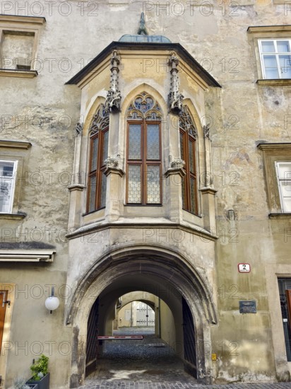 Gothic bay window above an archway on an old stone wall Göglhaus Krems Wachau Waldviertel Lower Austria Austria