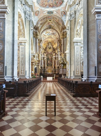 Opulently furnished nave with ornate Baroque ceiling decorations and symmetrical structure, Klosterneuburg Lower Austria Austria